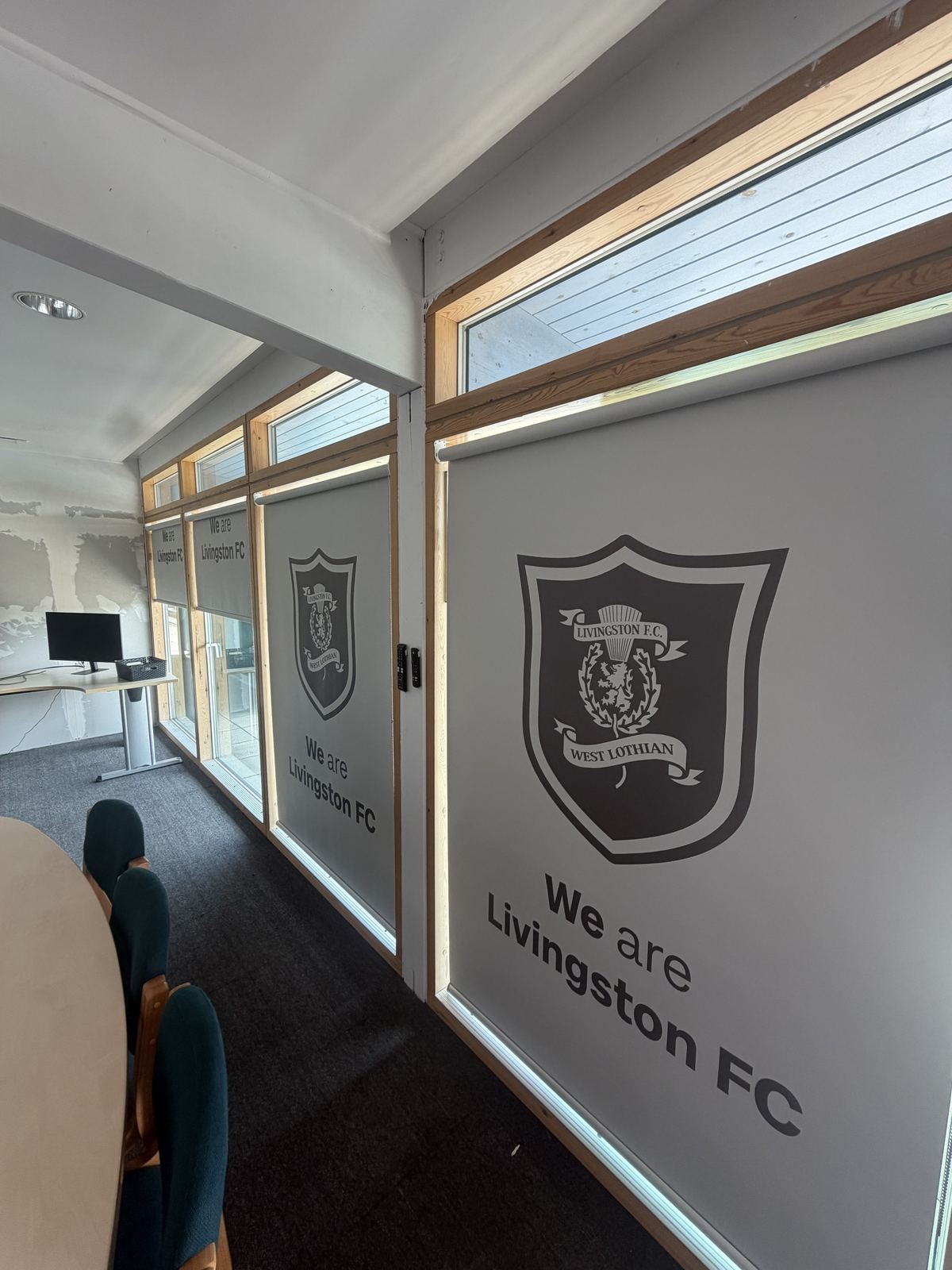 Motorised roller blind fitted in a home