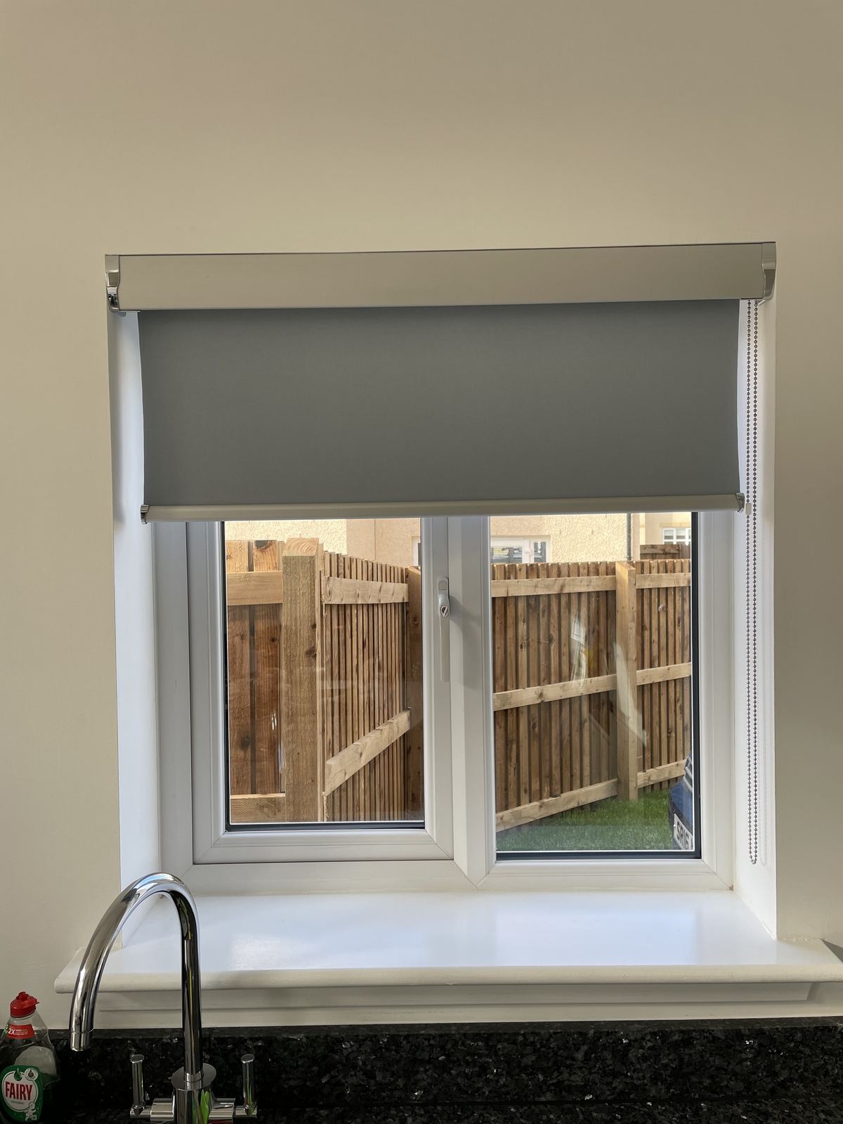 Roller blind fitted in a Livingston kitchen