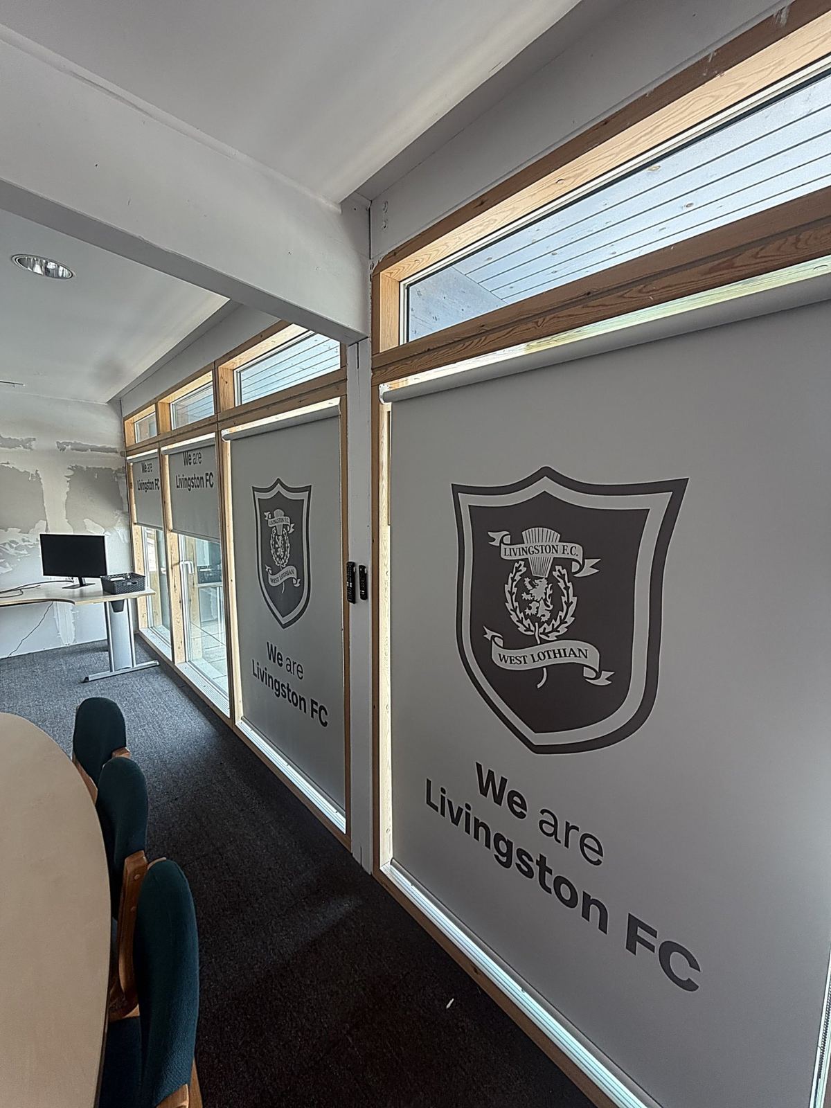 Printed roller blinds fitted at Livingston Football Club