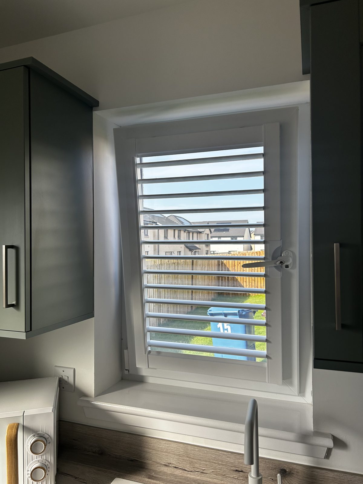 PVC shutter fitted to a kitchen window