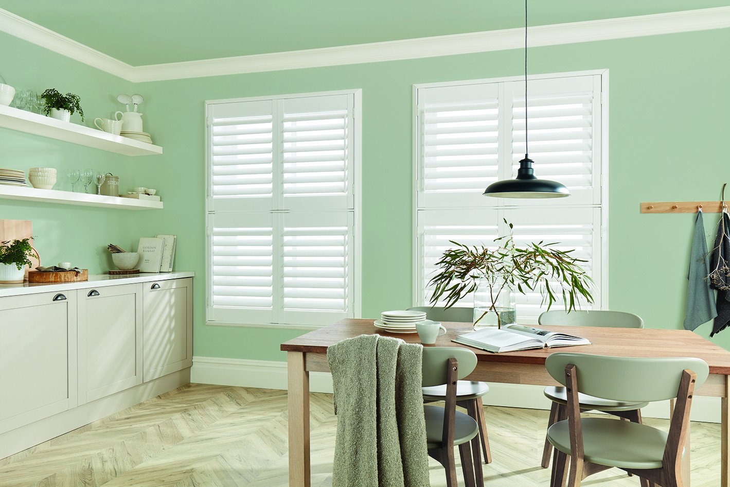 Tier-on-tier PVC shutters fitted in a kitchen