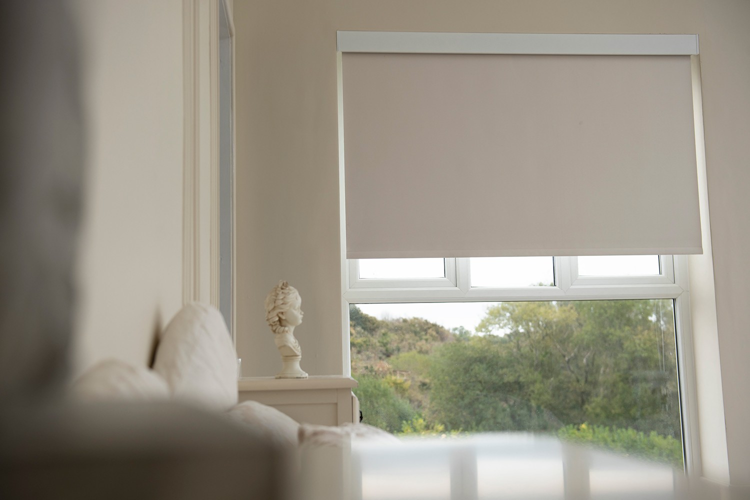 Roller blind fitted in a living room