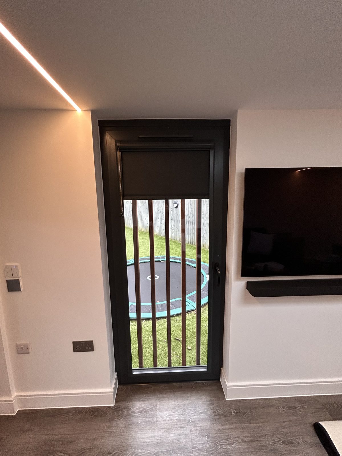 Roller blind fitted to sliding patio doors