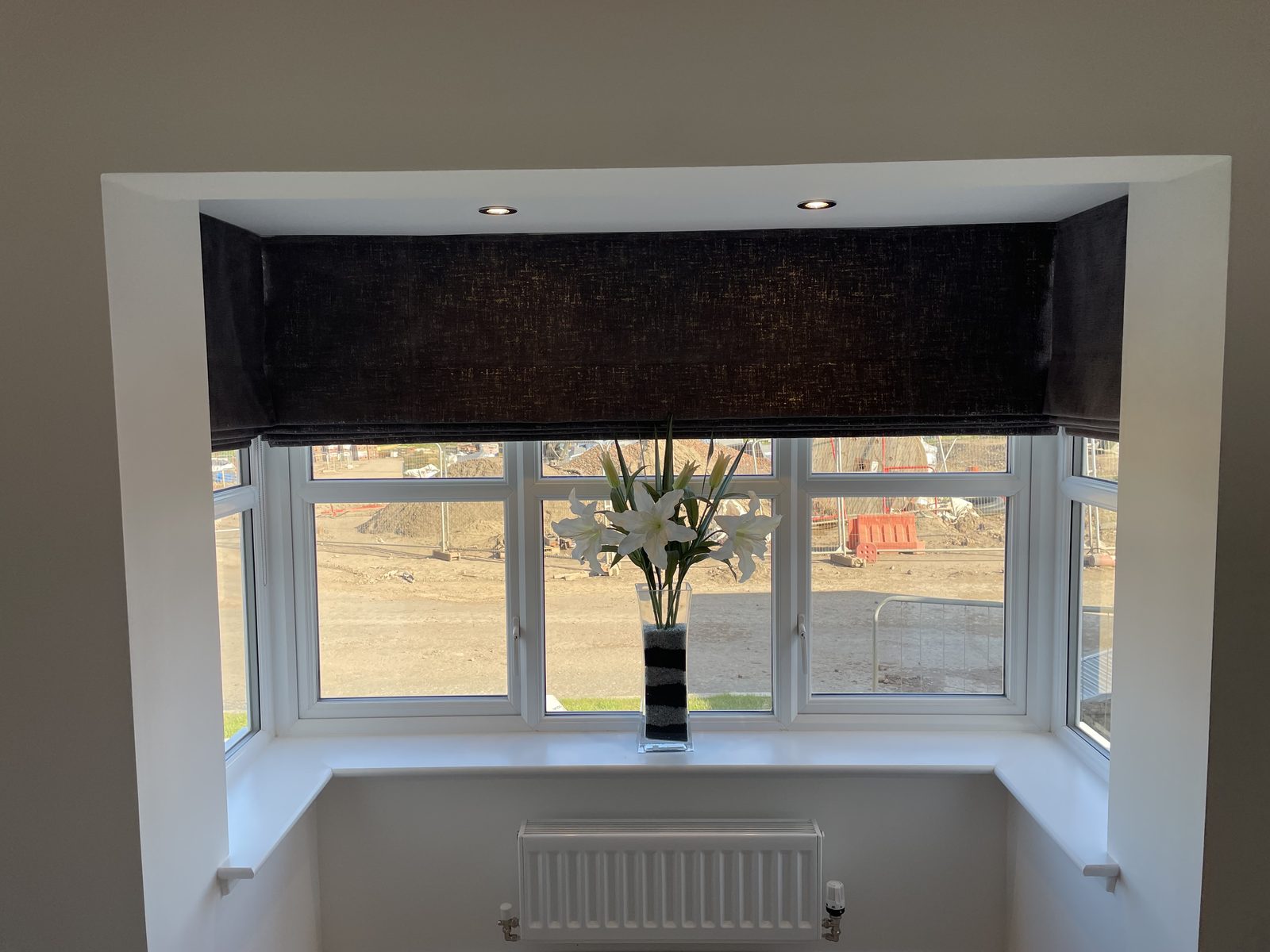 Roman blind installed in a living room