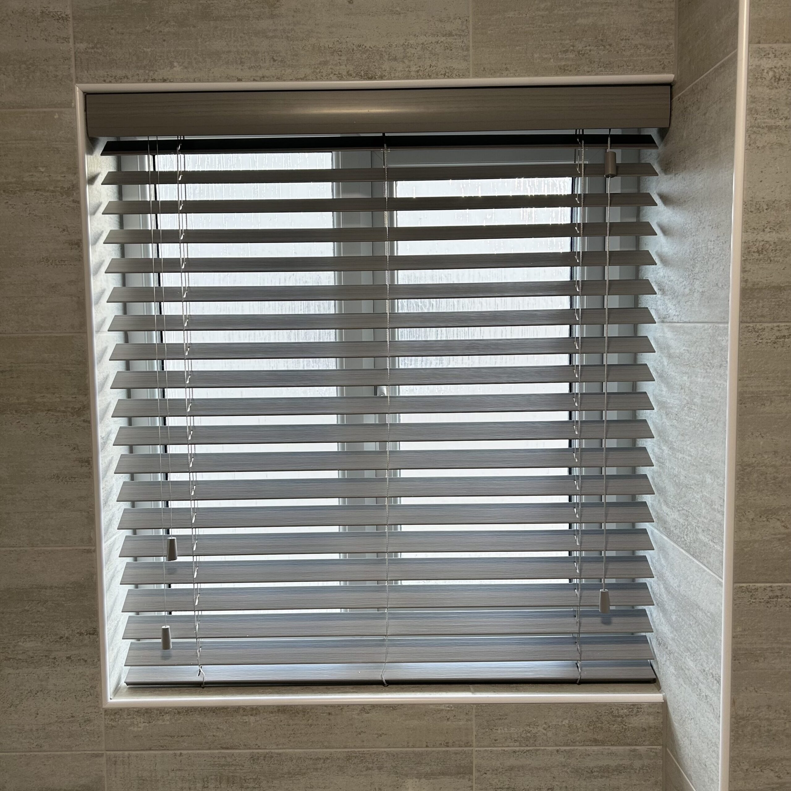 wooden blind fitted in bathroom