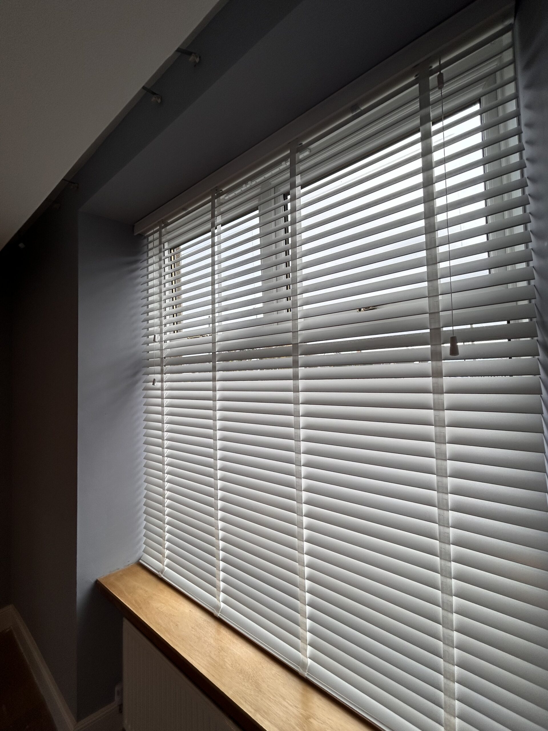 White wooden blinds with tapes installed in bathgate, west lothian